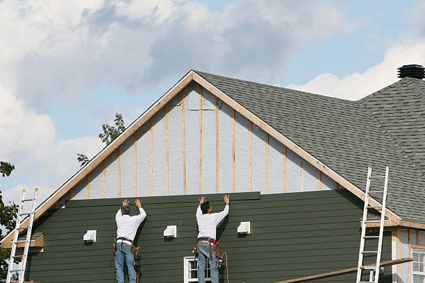 Professional Storm Damage Siding Repair technician working in Bryn Mawr, PA